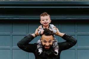 Father with child after paying Wisconsin child support