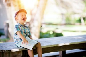 Young child laughing as reason for wills in Wisconsinn